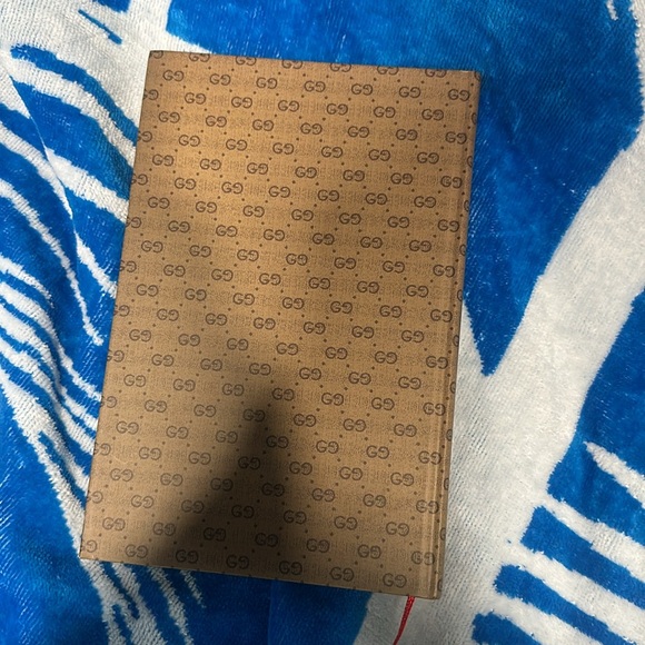 Gucci book with book mark and lined pages with Gucci at the bottom of each page - Picture 4 of 5